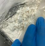 Podejrzana substancja w opakowaniu foliowym.