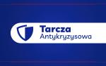 Napis Tarcza Antykryzysowa na niebieskim tle